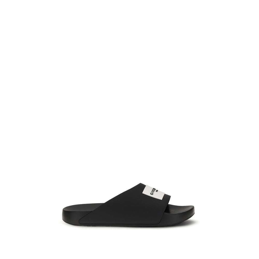 Givenchy Black Rubber Slippers 1728,72470364320,Black,EU39/US6,EU40/US7,EU41/US8,EU42/US9,EU43/US10,EU44/US11,EU45/US12,EU46/US13,Givenchy,Men,New with tags,Sandals - Shoes,Shoes,Slippers - Sandals - Shoes