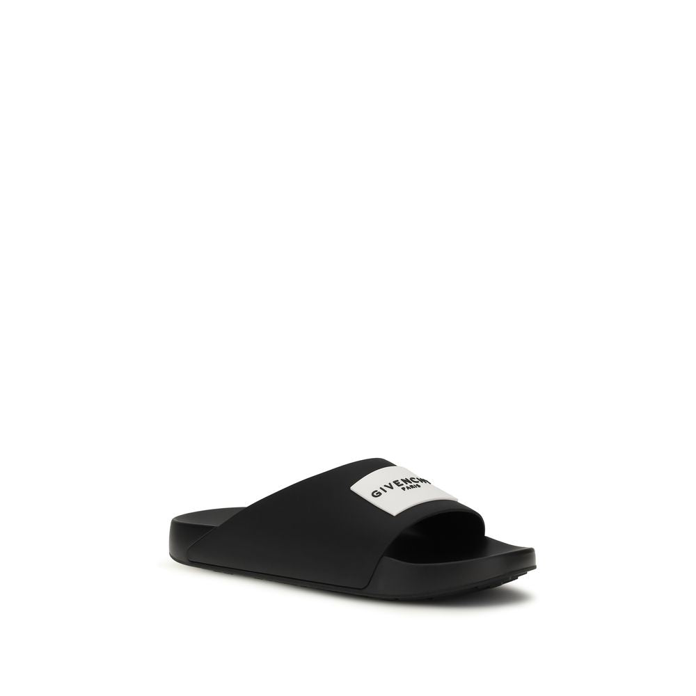 Givenchy Black Rubber Slippers 1728,72470364320,Black,EU39/US6,EU40/US7,EU41/US8,EU42/US9,EU43/US10,EU44/US11,EU45/US12,EU46/US13,Givenchy,Men,New with tags,Sandals - Shoes,Shoes,Slippers - Sandals - Shoes