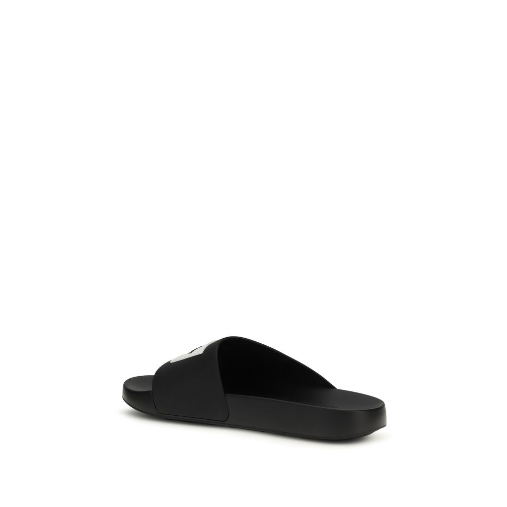 Givenchy Black Rubber Slippers 1728,72470364320,Black,EU39/US6,EU40/US7,EU41/US8,EU42/US9,EU43/US10,EU44/US11,EU45/US12,EU46/US13,Givenchy,Men,New with tags,Sandals - Shoes,Shoes,Slippers - Sandals - Shoes