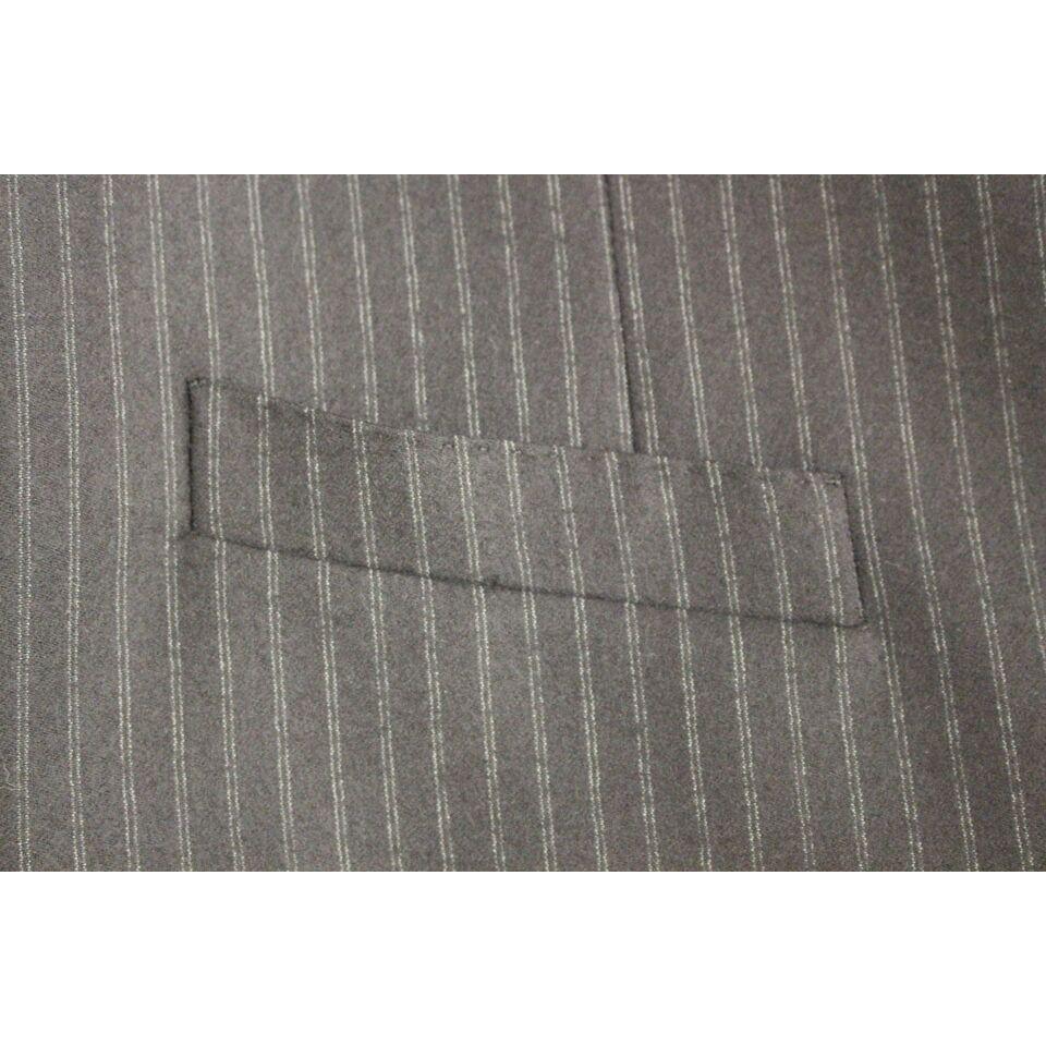 فستان من الصوف المخطط باللون الأسود من دولتشي آند غابانا