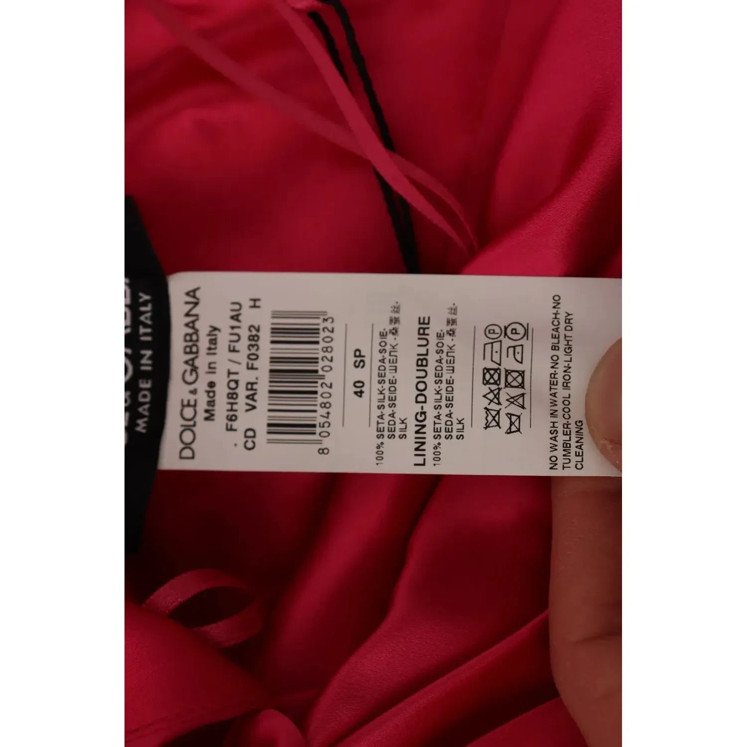 فستان دولتشي آند غابانا متوسط ​​الطول من الحرير باللون الوردي بقصّة ملائمة وكتف واحد