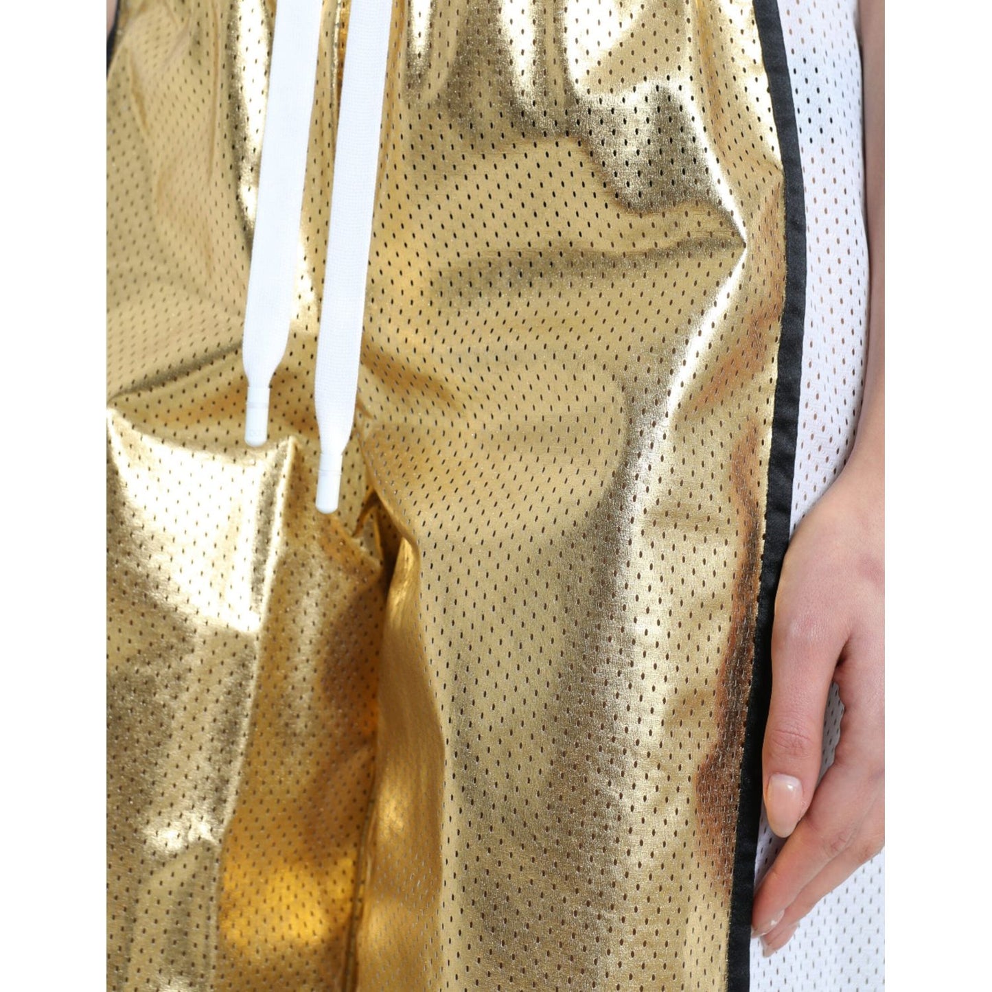 Dolce & Gabbana Elevated Elegance: High Waist Golden Shorts gold-polyester-perforated-high-waist-shorts