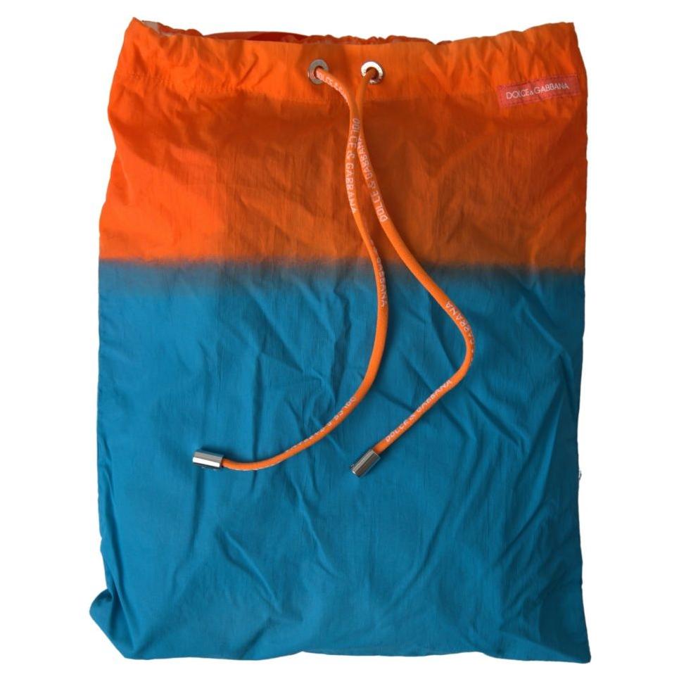 Dolce & Gabbana Gradient Effect Swim Shorts in Vibrant Orange orange-blue-gradient-beachwear-swimwear-shorts 465A2636-Medium-84b9c980-fd6.jpg