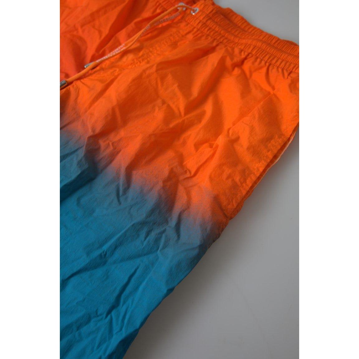 Dolce & Gabbana Gradient Effect Swim Shorts in Vibrant Orange orange-blue-gradient-beachwear-swimwear-shorts