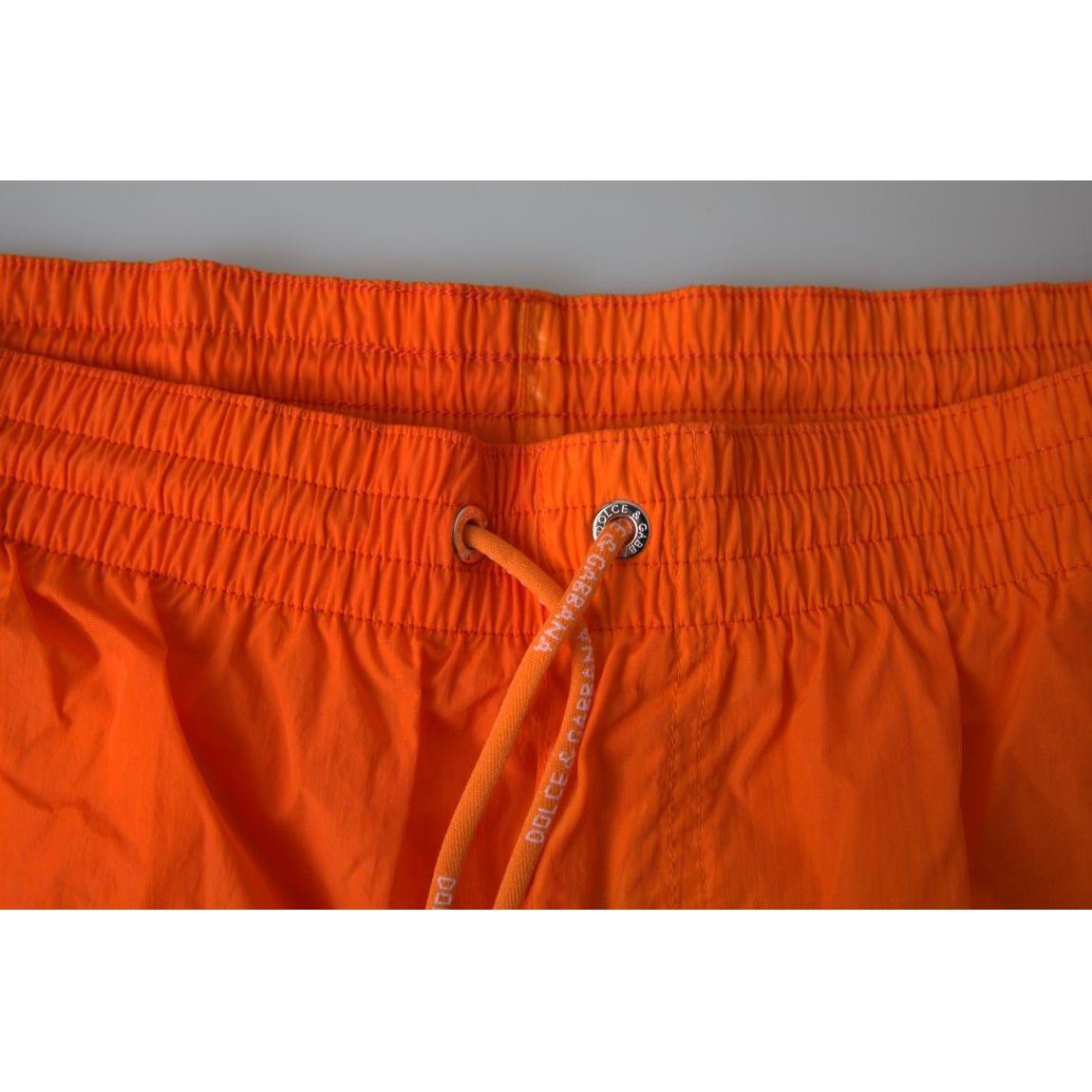 Dolce & Gabbana Gradient Effect Swim Shorts in Vibrant Orange orange-blue-gradient-beachwear-swimwear-shorts 465A2649-Medium-8264a802-42e.jpg