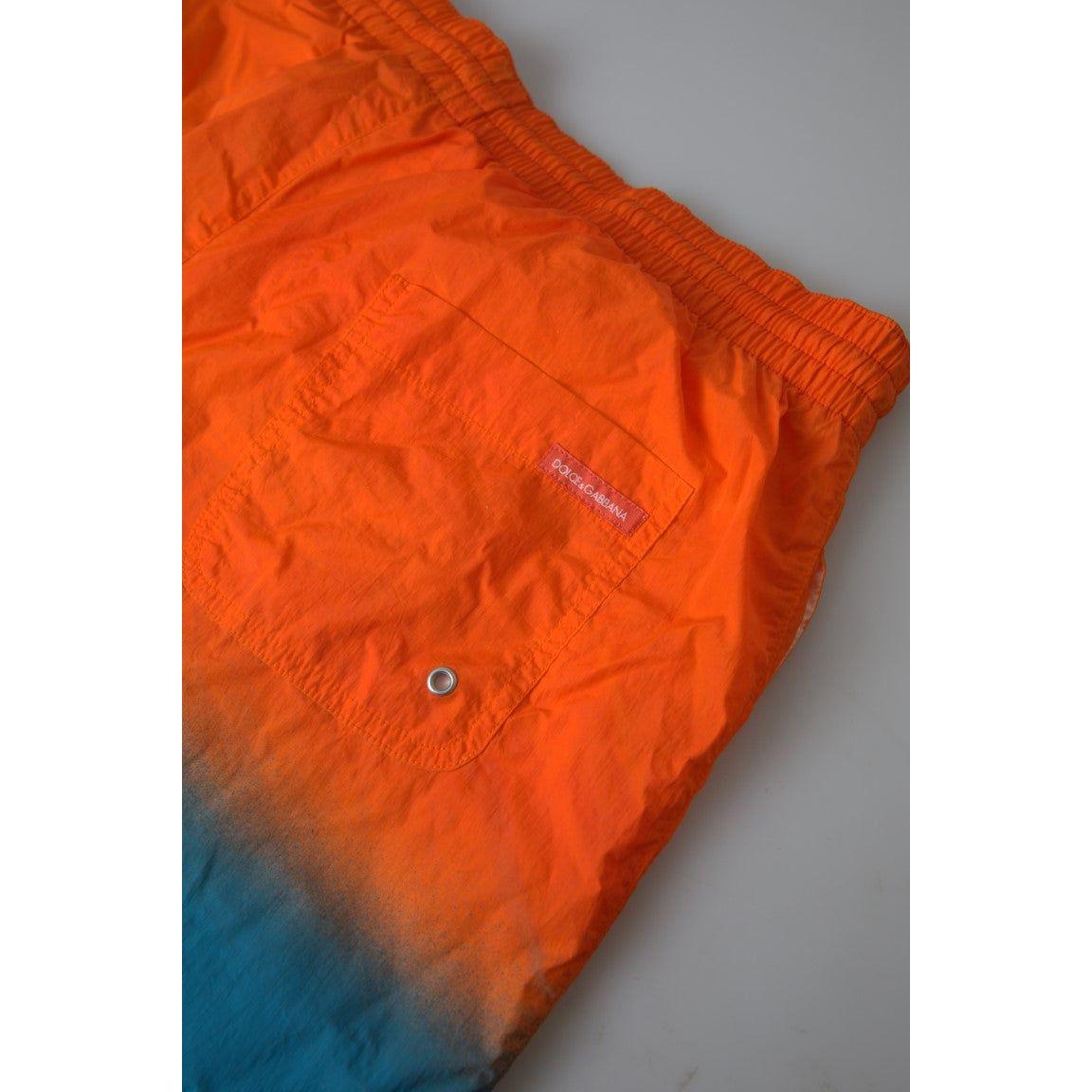 Dolce & Gabbana Gradient Effect Swim Shorts in Vibrant Orange orange-blue-gradient-beachwear-swimwear-shorts