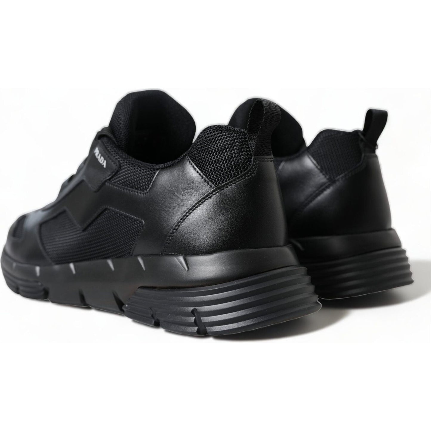 Prada Sleek Low Top Leather Sneakers in Timeless Black black-mesh-panel-low-top-twist-trainers-sneakers-shoes 465A4090-BG-scaled-349f77d4-5ac.jpg