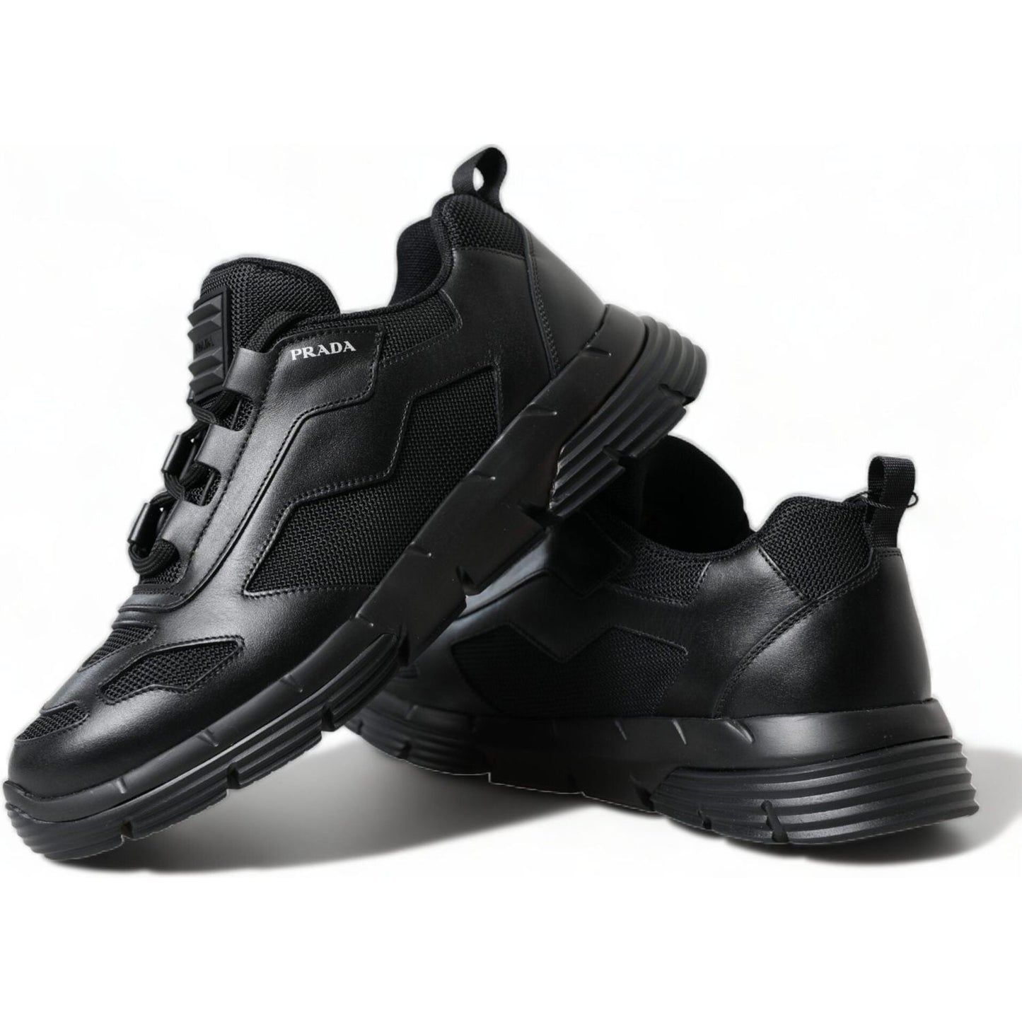 Prada Sleek Low Top Leather Sneakers in Timeless Black black-mesh-panel-low-top-twist-trainers-sneakers-shoes 465A4094-BG-scaled-af25547b-016.jpg