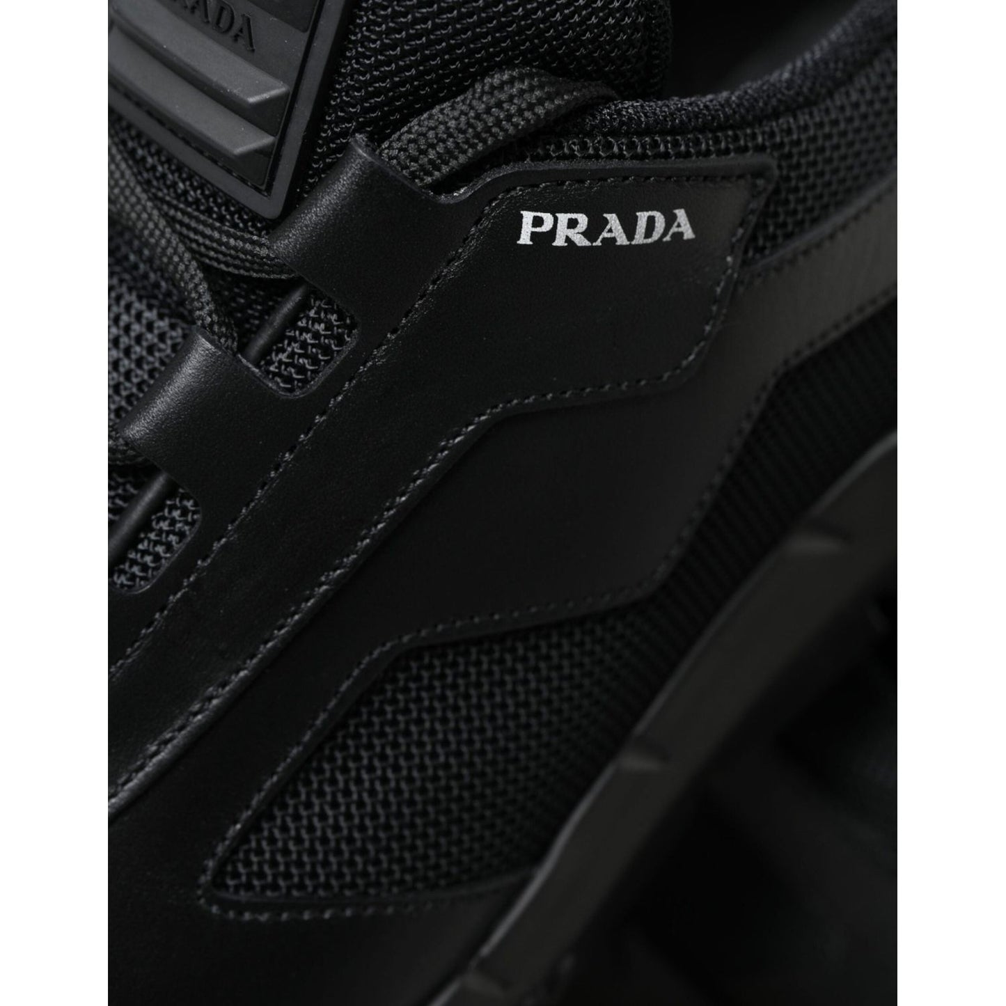 Prada Sleek Low Top Leather Sneakers in Timeless Black black-mesh-panel-low-top-twist-trainers-sneakers-shoes