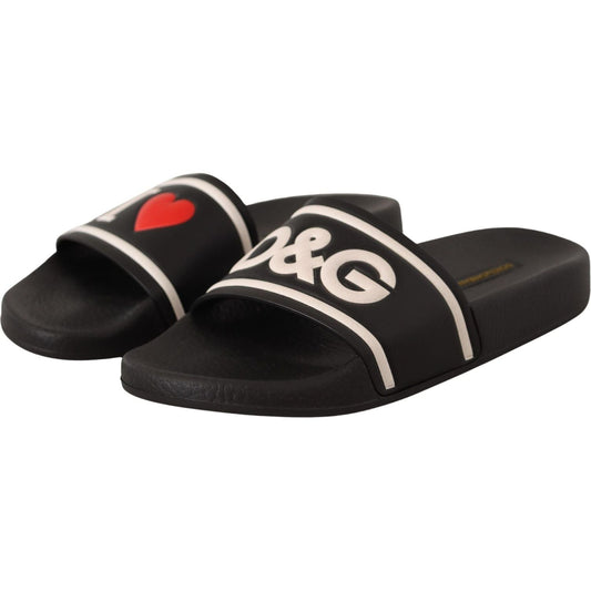 Dolce & Gabbana Elegant Black Leather Slide Sandals for Her black-leather-i-love-d-g-slides-sandals IMG_0160-scaled-fbfdc64d-f11.jpg