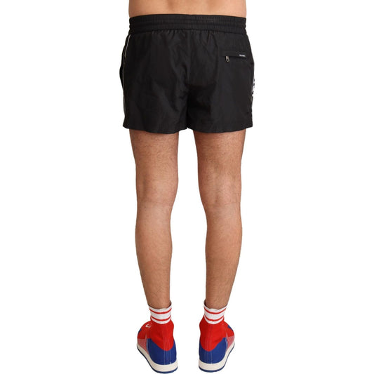 Dolce & Gabbana Elegant Black KING Motive Swim Trunks black-king-mens-beachwear-swimwear-shorts