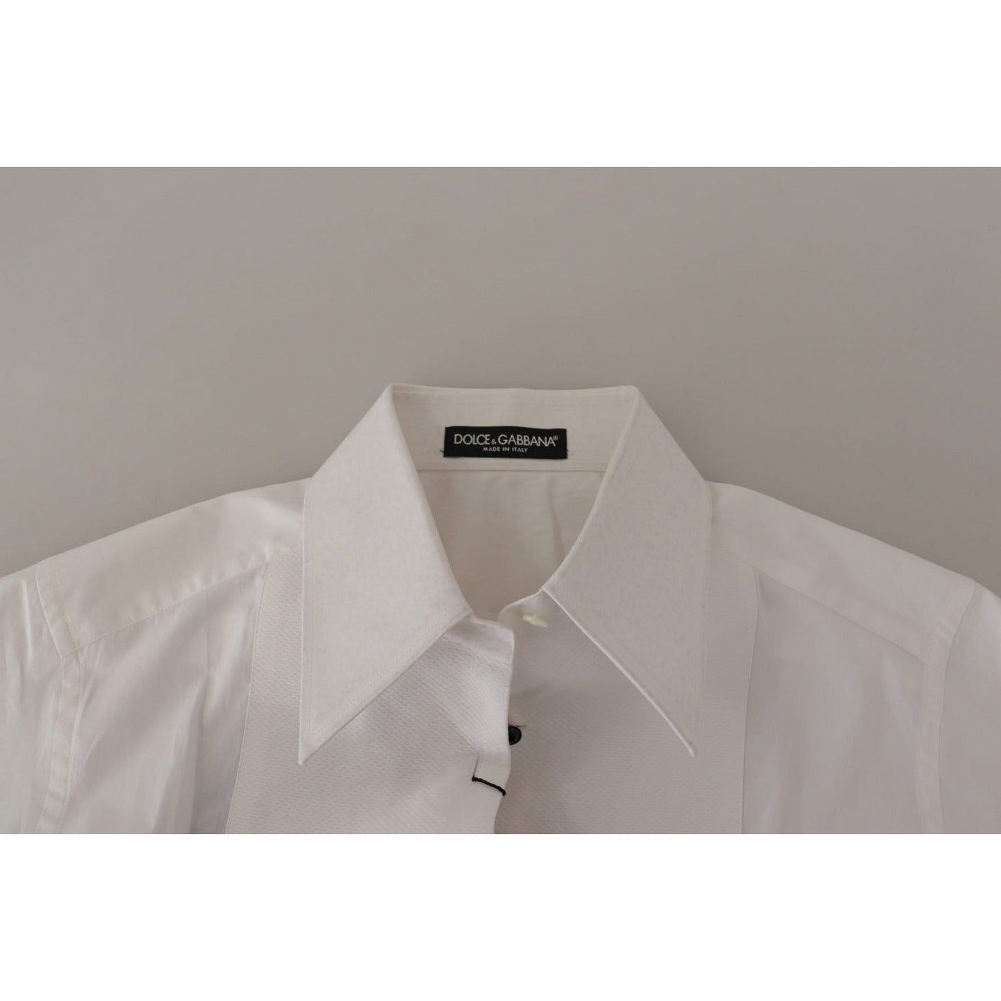 Dolce & Gabbana Elegant Sleeveless Tuxedo Blouse with Crystal Buttons white-sleeveless-tuxedo-formal-blouse-top